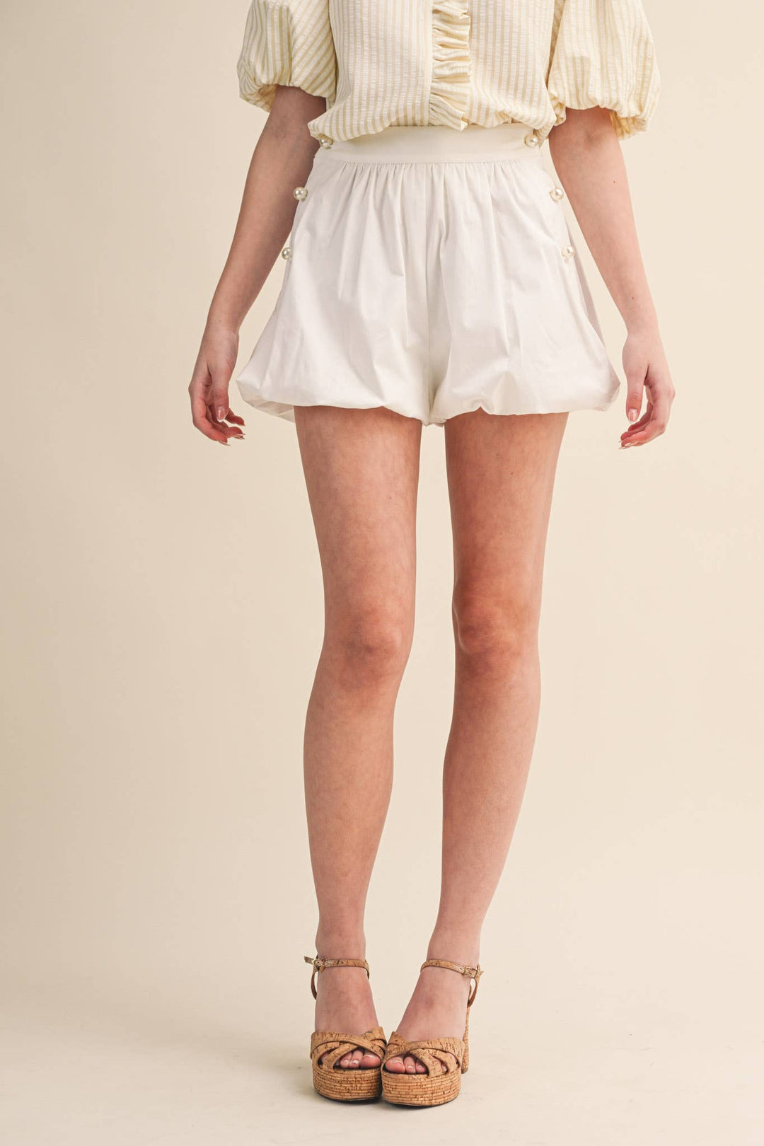 BUBBLE HEM SHORTS WITH PEARL BUTTONS