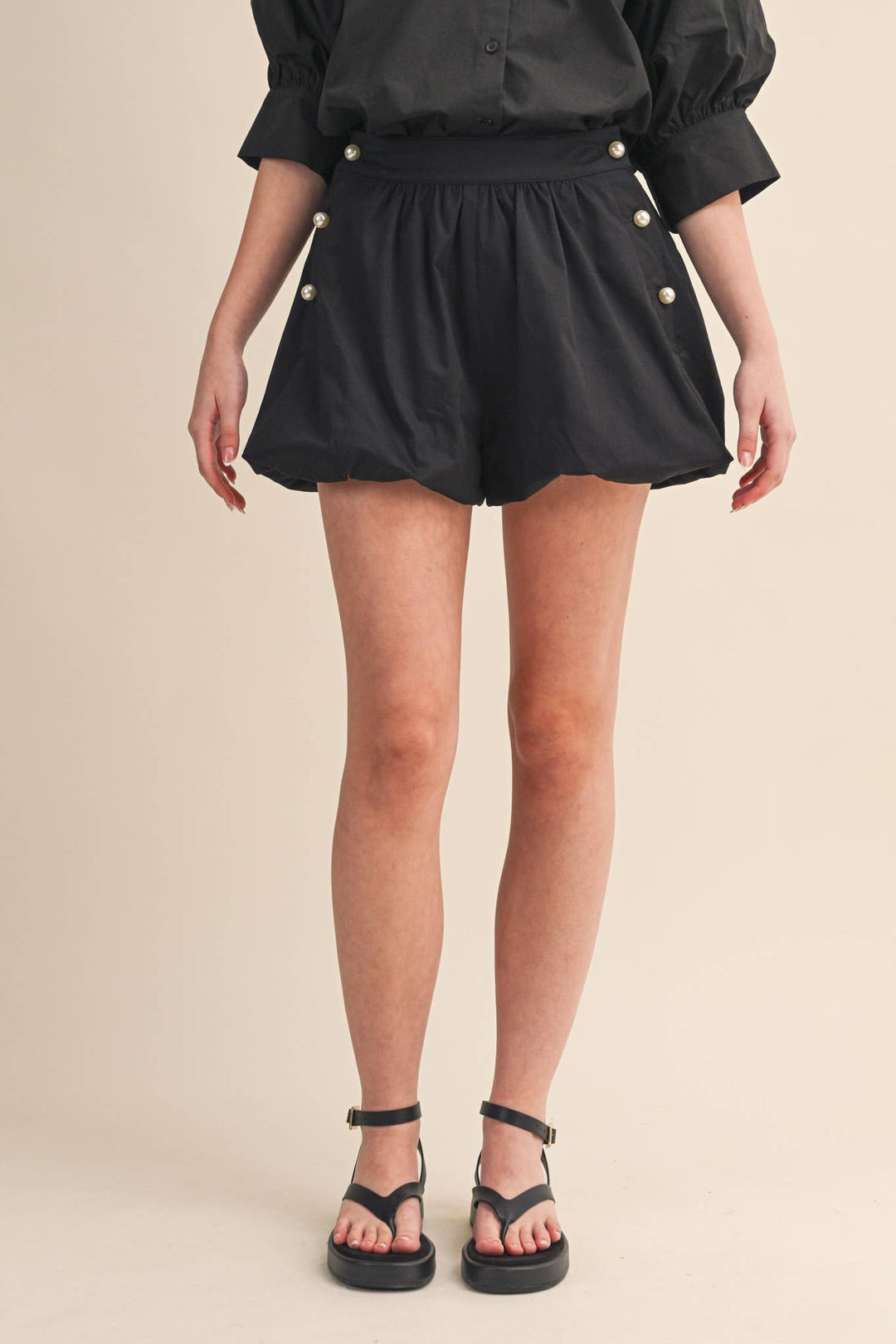 BUBBLE HEM SHORTS WITH PEARL BUTTONS