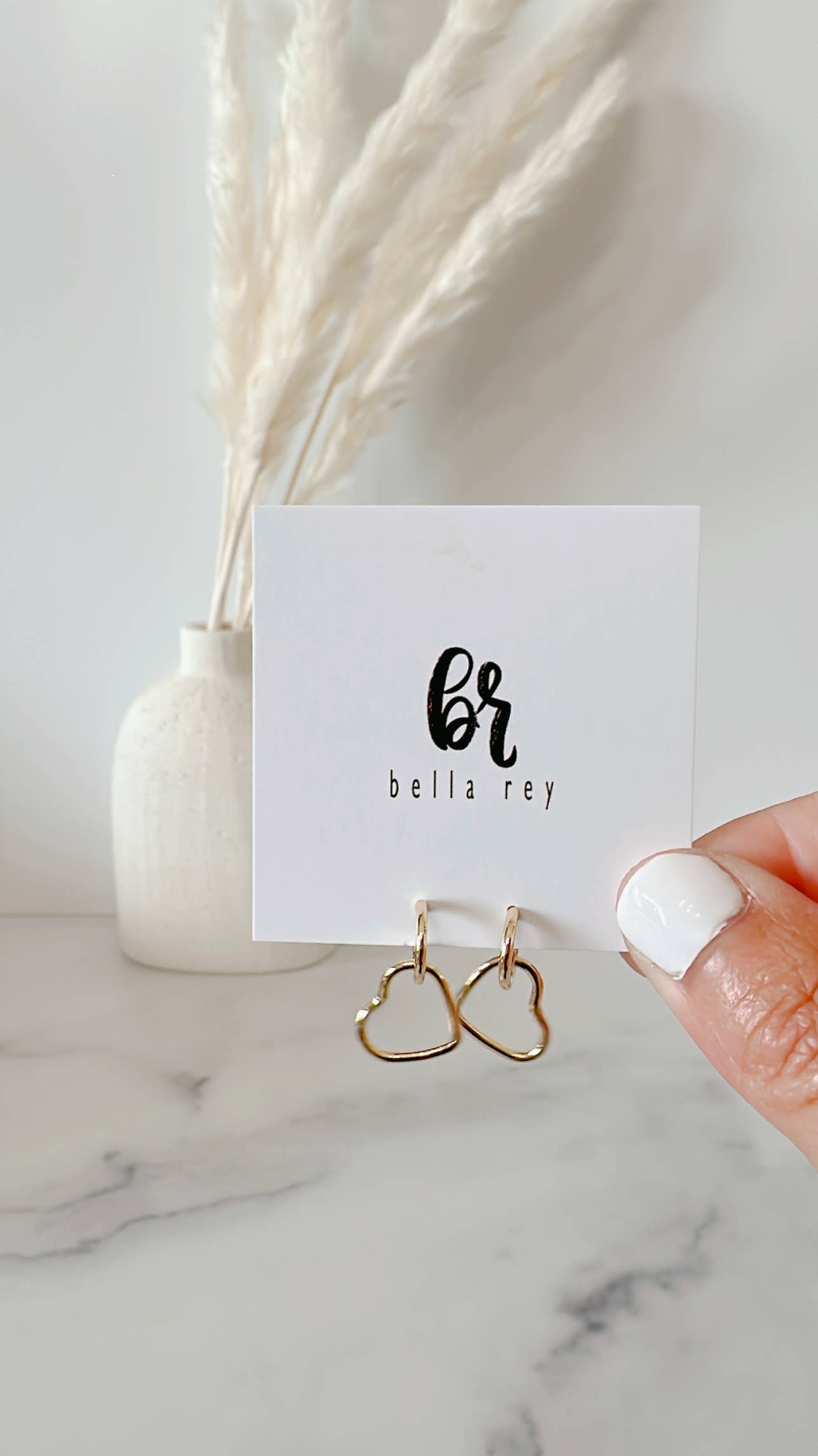 The Embree heart gold plated stud earrings
