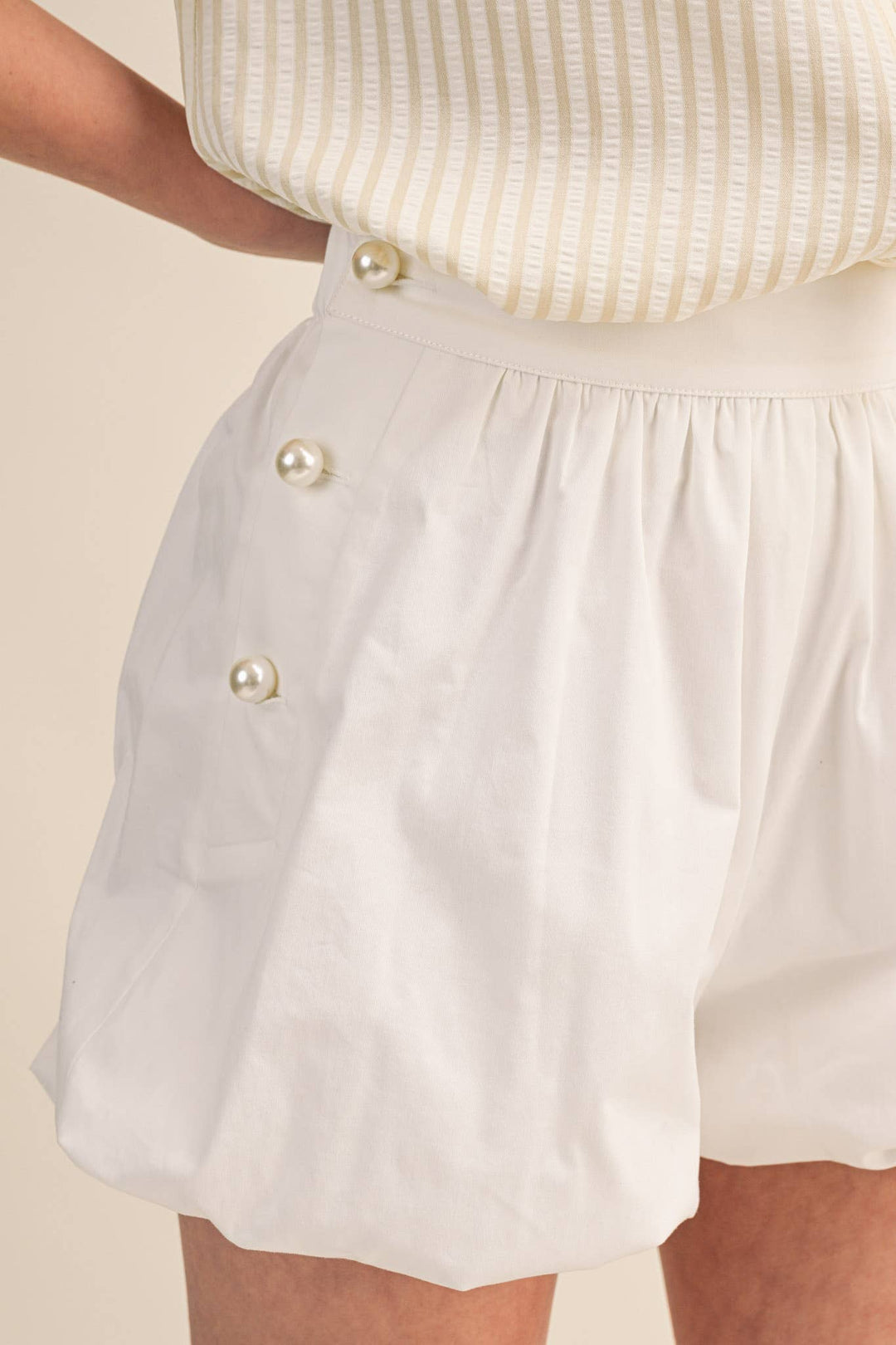 BUBBLE HEM SHORTS WITH PEARL BUTTONS